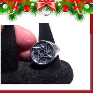 MEN RING WITH METALLICA WORDS ON EACH SIDE AND LARGE SYMBOL ON CENTER. NEW